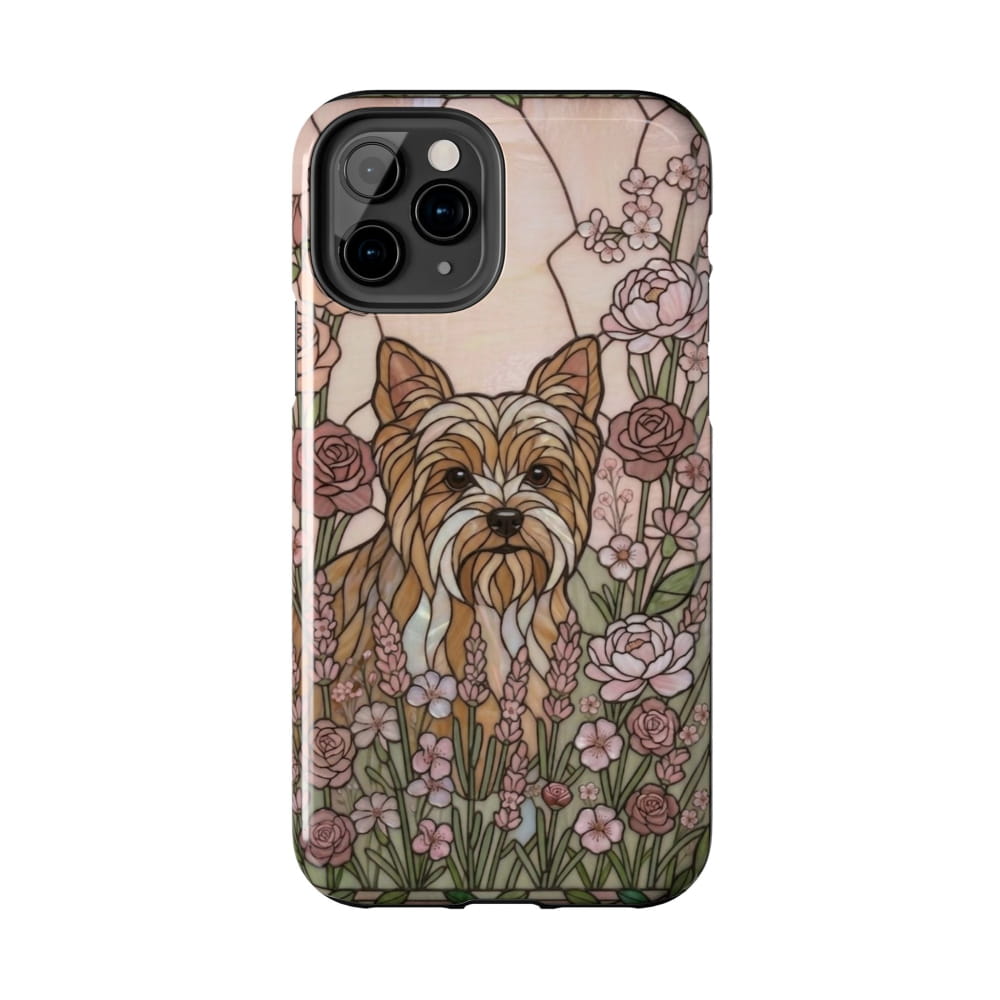 Phone case with a dog illustration surrounded by flowers on a white background
